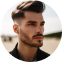 A man with a goatee and a beard.